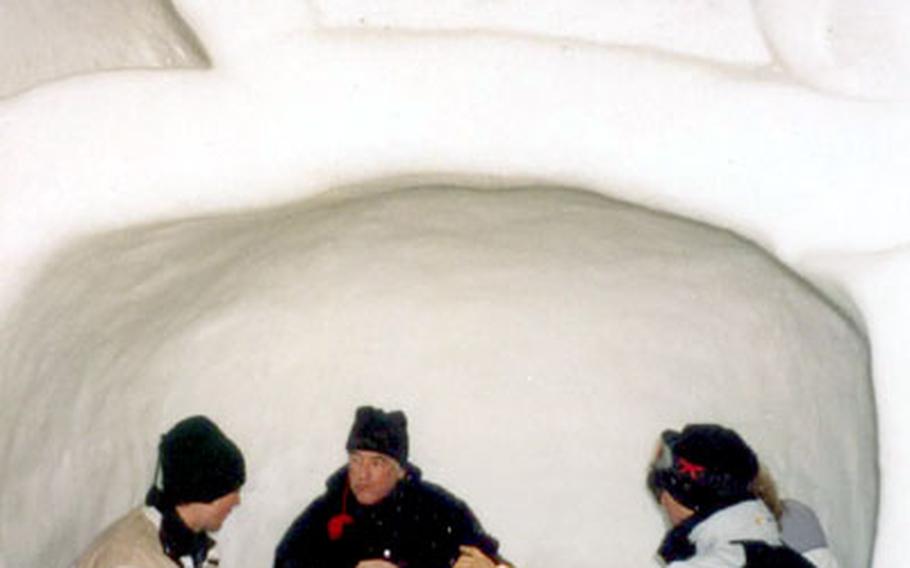 Skiers enjoy a break at an igloo on the Zermatt slopes. The adventurous can even spend the night in the snow hut.