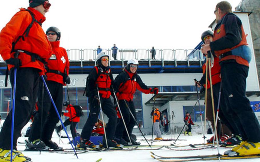 Members of the National Ski Patrol prepare to review ski and sled skills during an instructor’s course at the Hintertux glacier in Austria earlier this month. They are, from left, Tom Haake, Steve Briggs, Michaela Saeftel, Stella Reuter, Tom Saxen and Al Prucnal.