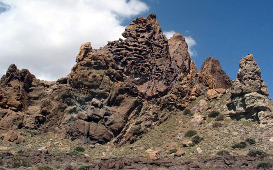 Parque Nacional del Tiede, in Tenerife, Canary Islands, covers more than 32,000 acres of stark volcanic terrain. In the heart of the park is El Teide, at 12,352 feet, the tallest mountain in Spain.