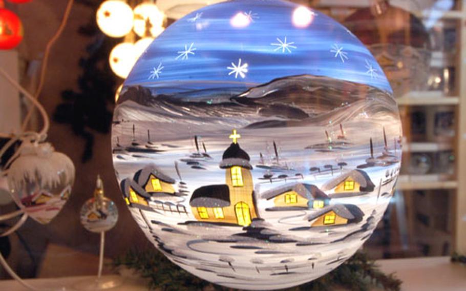 A beautiful hand-painted glass Christmas tree bulb on sale at the Christmas market in Mannheim.