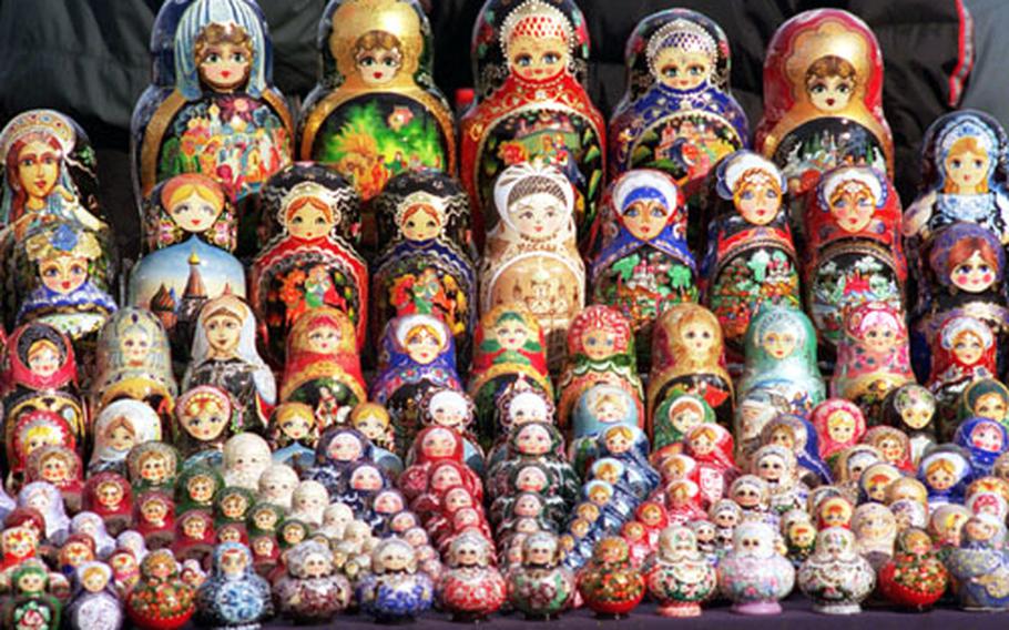 Matryoshkas, or nesting dolls, of traditional smiling ladies or the political figures of the day, can be found in Russia and Prague.