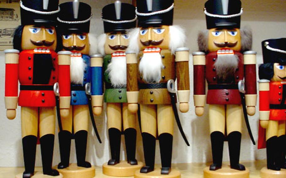 Nutcrackers stand for review at the Seiffen Folk Art Cooperative.