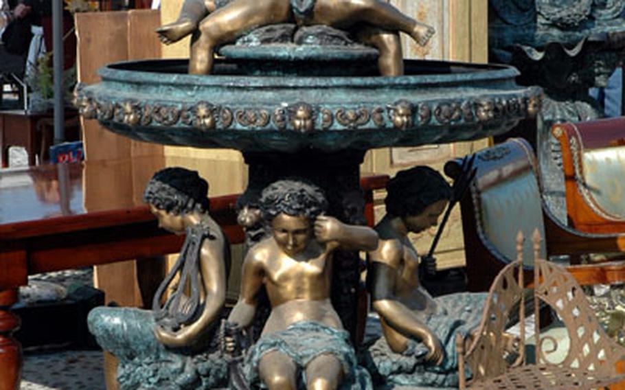 Some lawn somewhere is waiting for this cherub fountain. Because of its size, the market in Piazzola sul Brenta attracts many unusual and unique items.