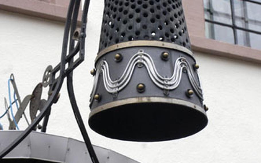 A giant thimble hangs over the door of the Fingerhutmuseum in Creglingen, Germany. “Fingerhut” is German for thimble.