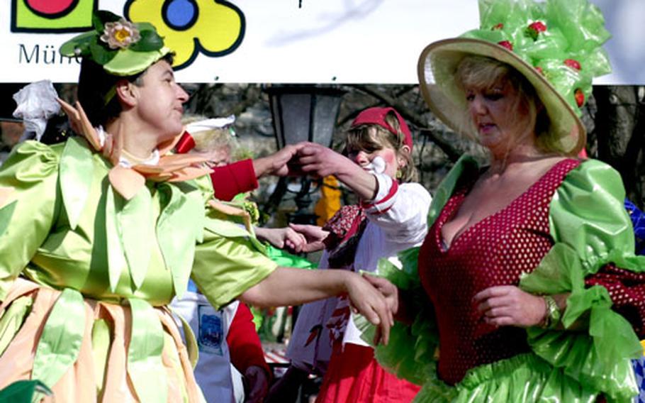 The Dance of the Market Women on the Viktualienmarkt in downtown Munich, Germany, is the highlight of the Fasching celebrations in the Bavarian capital. Their performance lasts about 45 minutes, and yes, they are really women who work at the market.