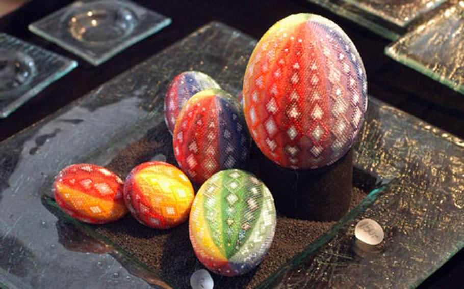 Helmut Meister’s colorful eggs are made by hand-gluing glass pearls onto the eggs.