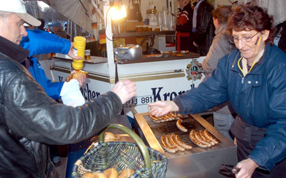 Outside the stadium, fans in Germany gather before soccer games to consume sausages, pork sandwiches, beer and soft drinks.