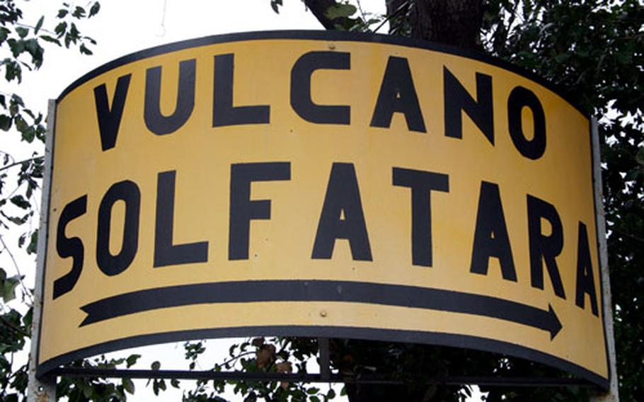 A sign directs visitors to the Volcano Sofatara. Volcanic gases are supposed to be good for the skin and internal body, but they come with an odor that smells like rotten eggs.