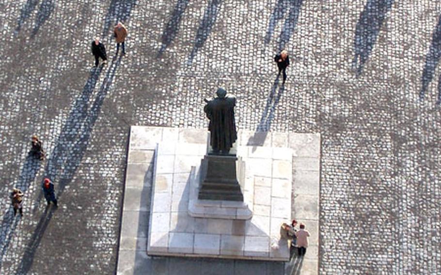 From the top of the Frauenkirche, you can watch people mill aroud the statue of Martin Luther that stands in front of the chapel.