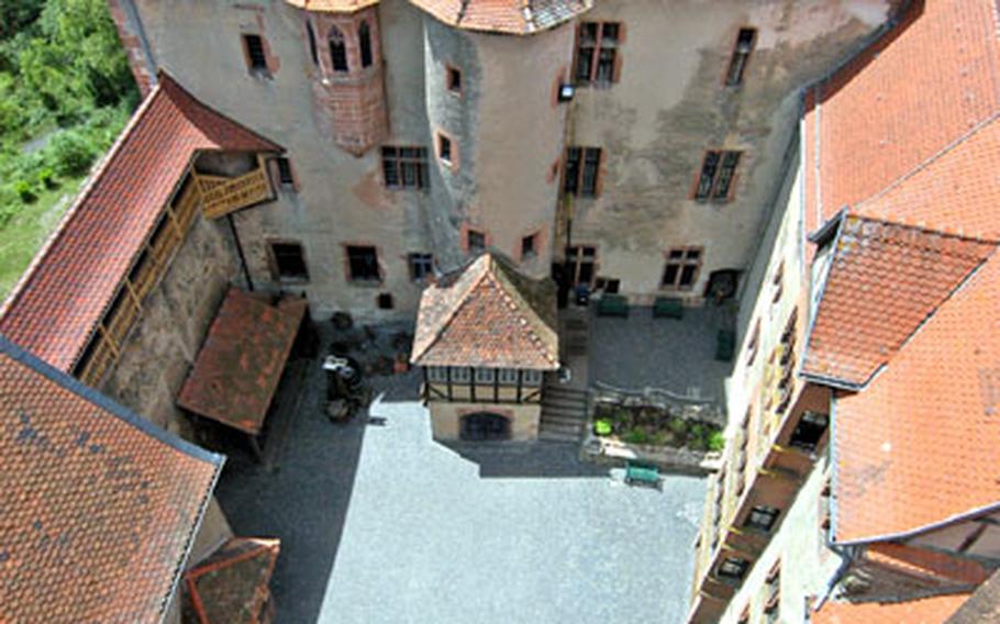 A view of Ronneburg&#39;s inner courtyard and buildings from the castle&#39;s tower. You have to climb 143 steps for this view.