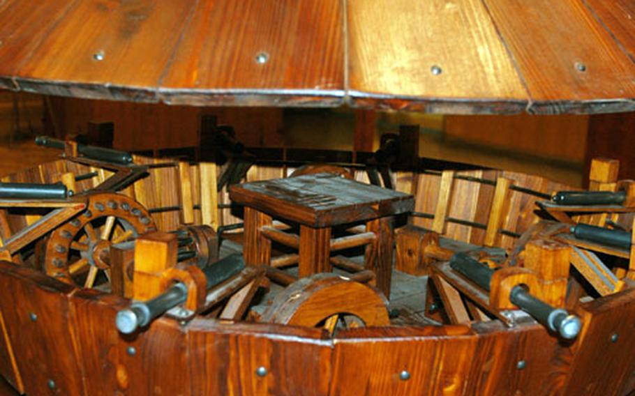An inside view of da Vinci’s wooden tank shaped like a tortoise with cannons and perhaps reinforced with metal plates.