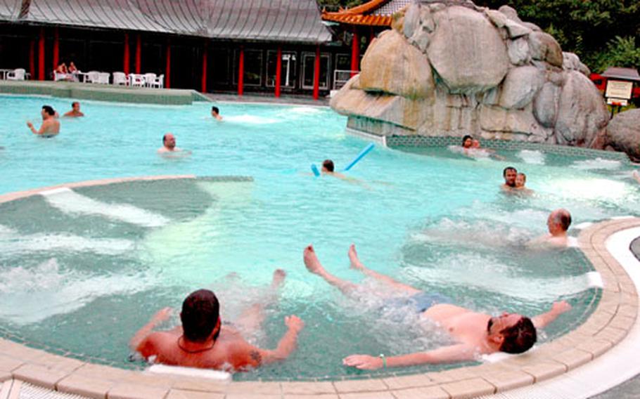 Patrons lounge in the outdoor pool at the Taunus Therme, one of Bad Homburg’s three thermal baths. One million liters of mineral water are pumped through the pools every hour.