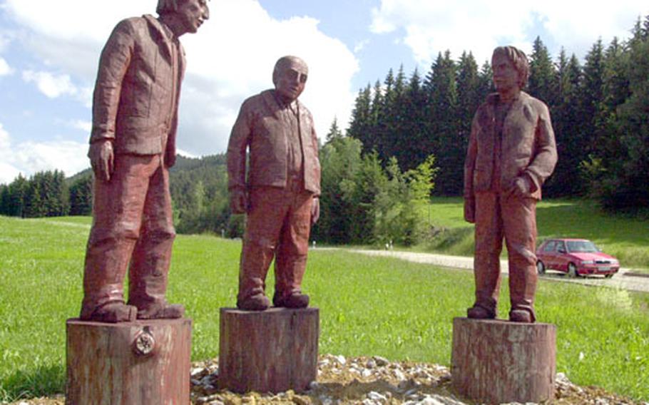 These carved wooden figures greet visitors on the road into Bodenmais.