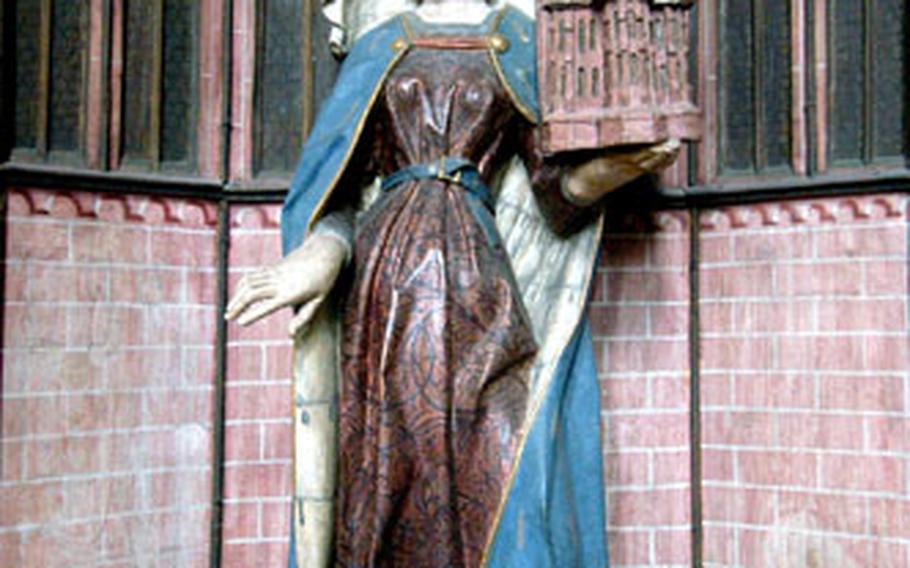 This statue of St. Elizabeth stands in the church of the same name in Marburg.