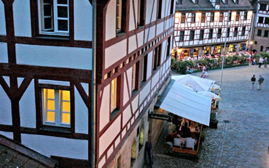 Half-timbered houses that date to the 1300s line the streets around the Kaiserberg castle in Nuremberg, Germany.