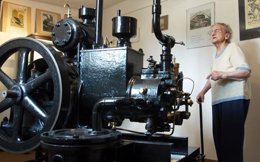 Erna Tollkiehn, 86, tells the storuy of the Otto motor, forerunner of today’s car engines. She is the curator at the Nicolaus August Otto Museum in Holzhausen.