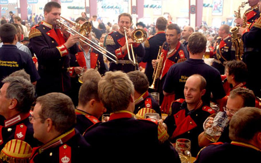 Daytime visitors to an Oktoberfest beer tent could be treated to a performance by one of the bands that roams the festival and strikes up tunes.