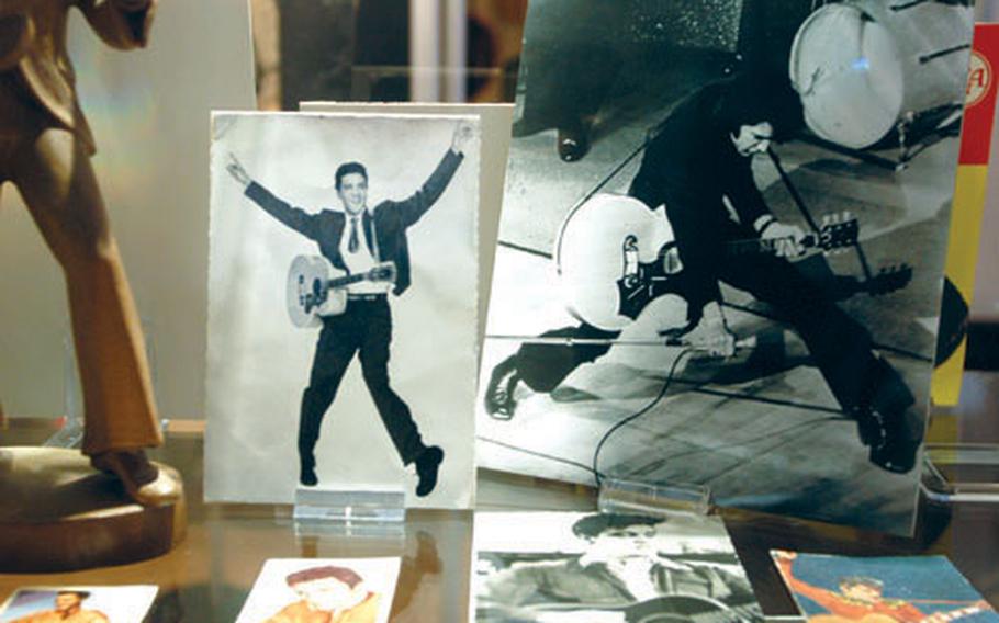 Elvis Presley memorabilia is on display in a special glass cabinet in the Büdinger 50er-Jahre-Museum in Büdingen, Germany.