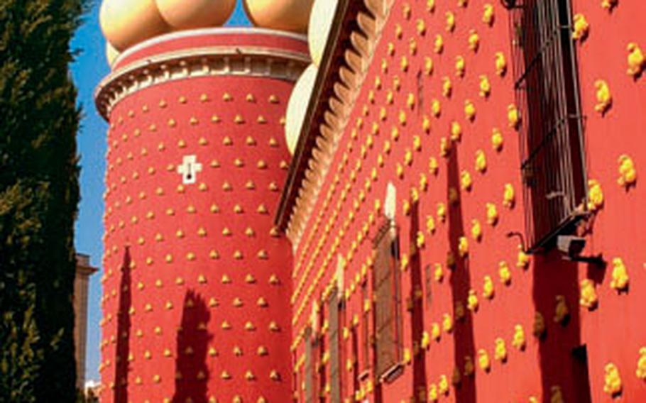 Part of the Theatre-Museu Dali in Figueres is painted red and topped with sculptures of eggs, a symbol of fertility. Inside the visual onslaught continues with huge paintings, drawings and sculptures by Salvador Dali.