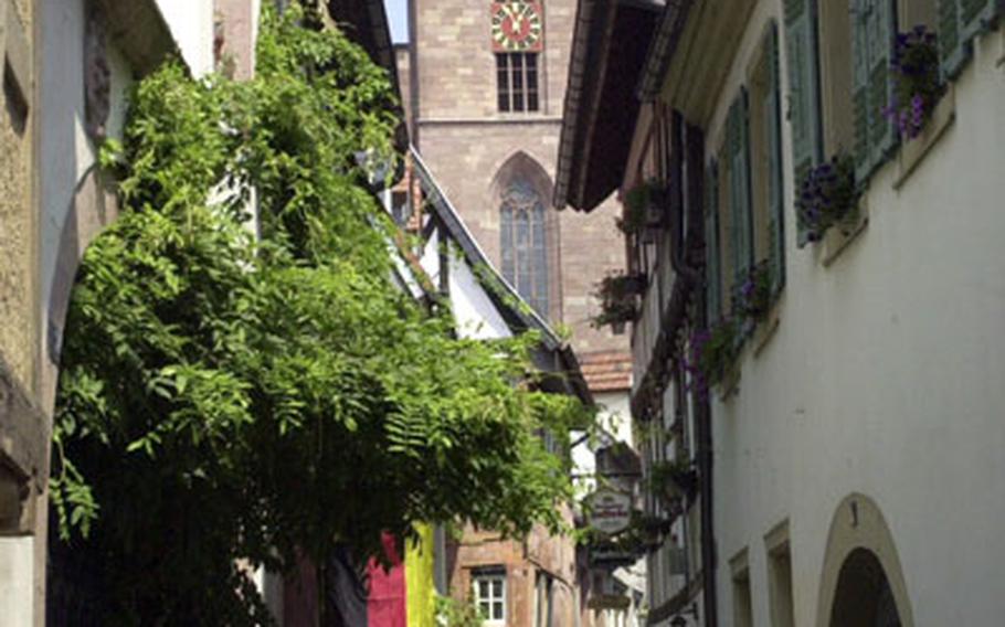 A view down the narrow Metzergasse street in Neustadt an der Weinstrasse. The medieval alley leading from the Marktplatz has the oldest half-timbered house in Rheinland Pfalz.