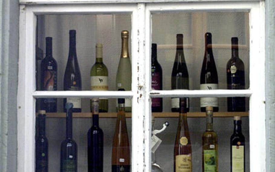 Locally produced wines are displayed in a store window in Neustadt an der Weinstrasse.