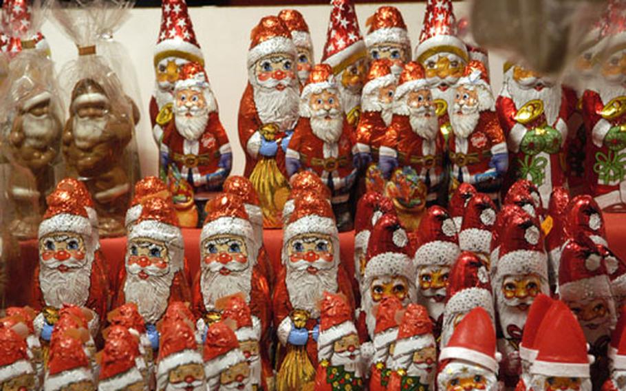 Rows of chocolate St. Nicks on sale at the Darmstadt, Germany, Christmas market.