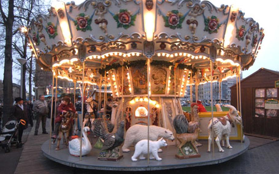 There are rides for the kids at the Christmas market in Mannheim, as is the case at most holiday markets in Germany.