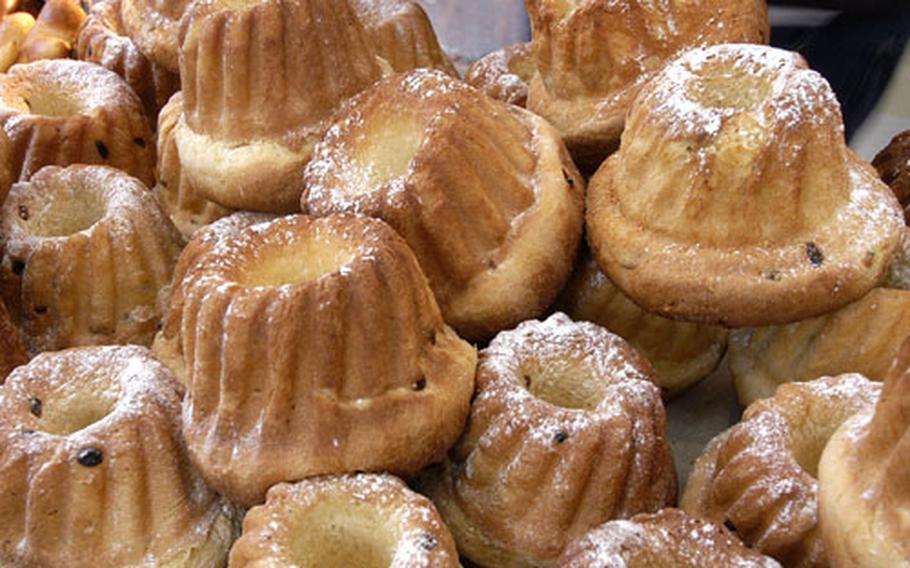 Kougelhopf, a specialty of the Alsace, on sale at the Christmas market in Ribeauville, France.
