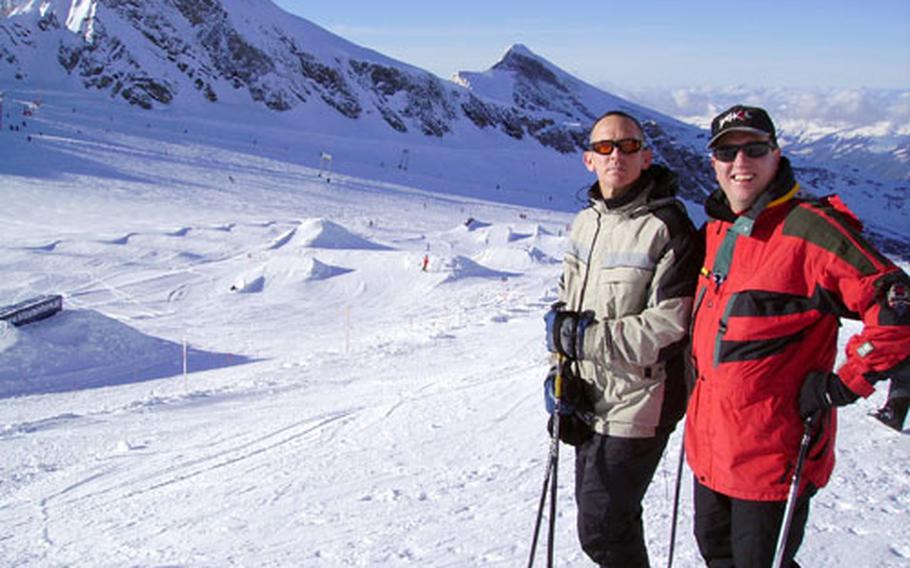 Master Sgt. Mark Pickett, left, and Bavarian Ski Club president Chris Lawton catch their breath at the top snowboard park at the Kitzsteinhorn ski area near Kaprun, Austria, on Veterans Day.
