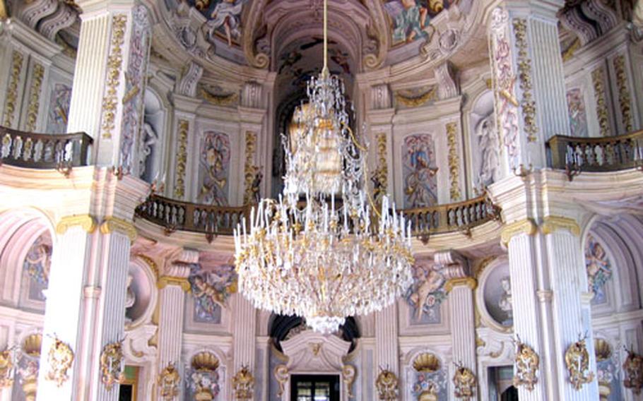This massive chandelier inside Stupinigi’s rococo central hall is one the villa’s attractions. This is the best known of the Savoy family’s villas in Turin, Italy. Emanuele Filiberto, the duke of Savoy, moved his capital to Turin in 1562.