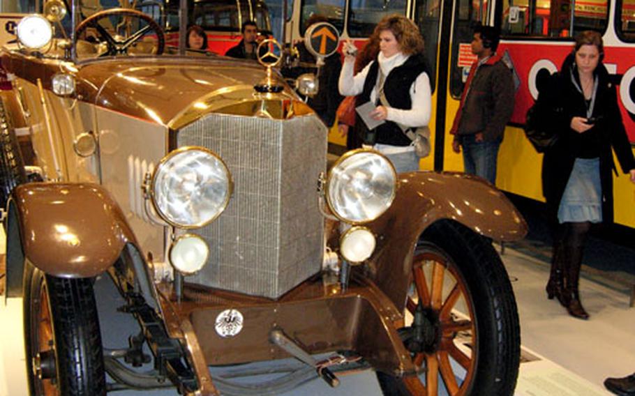 At the newly reopened Mercedes-Benz Museum, rooms are filled with buses and cars, such as this 1921 Mercedes-Knight 16/45 PS Tourwagen (top speed 50 mph).