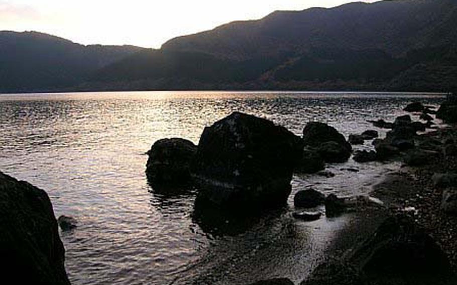 Lake Ashi at sunset as seen from Ashinoko Camping Village.