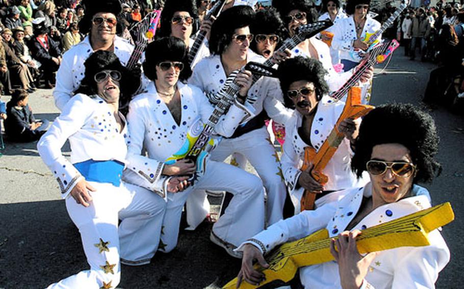 By the looks of the 2006 carnival in Peniche, Portugal, Elvis is alive and well and performing with a group of look-alikes.