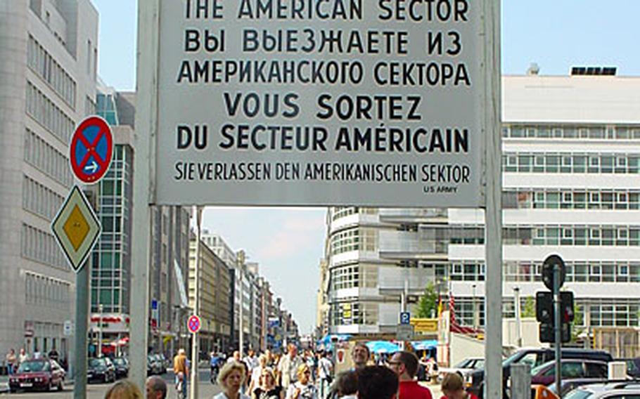 The former Checkpoint Charlie border crossing on Friedrichstrasse is marked by a sign.