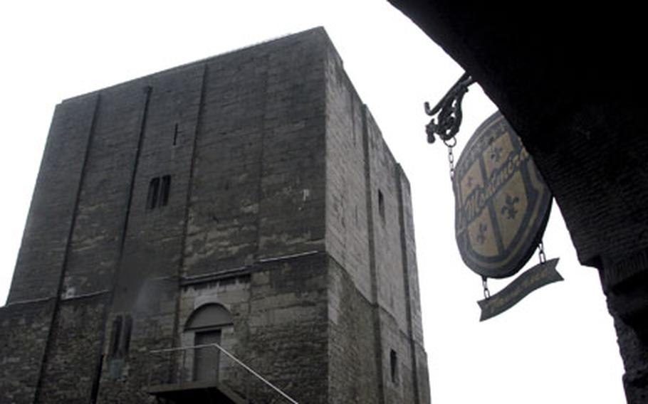 The ancient Tour Burbant dominates the center of town. It is a medieval military keep completed in 1166. The tower stands about 65 feet, its walls a stout 13 feet thick. Inside, a brief film recounts the history of the great tower and the forces that shaped Ath.