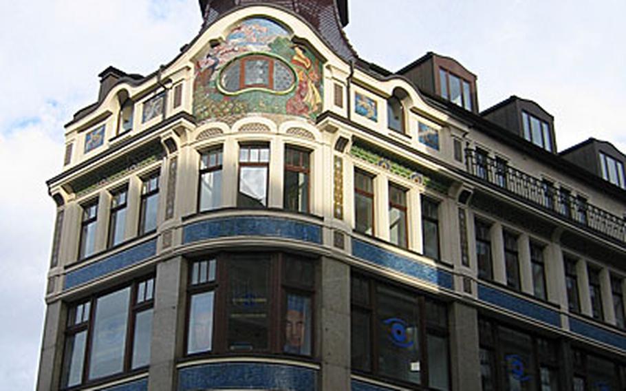 The Riquet coffee house, while not the city&#39;s oldest, certainly ranks as one of the most attractive. The small tower perched atop the building is based on traditional Chinese architecture, while other distinctive features of the building include the two elephant heads flanking its sign and a mosaic panel in art nouveau style.