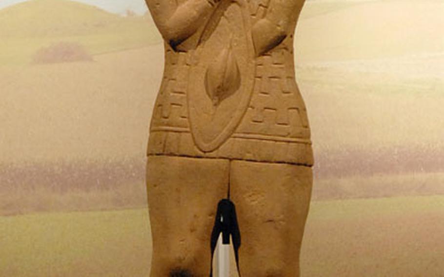 The 2,500-year-old stone statue of a Celtic prince. Complete except for his feet, the statue was discovered near the village of Glauberg and is a major archaeological find. It is on display until the museum&#39;s closing in September.