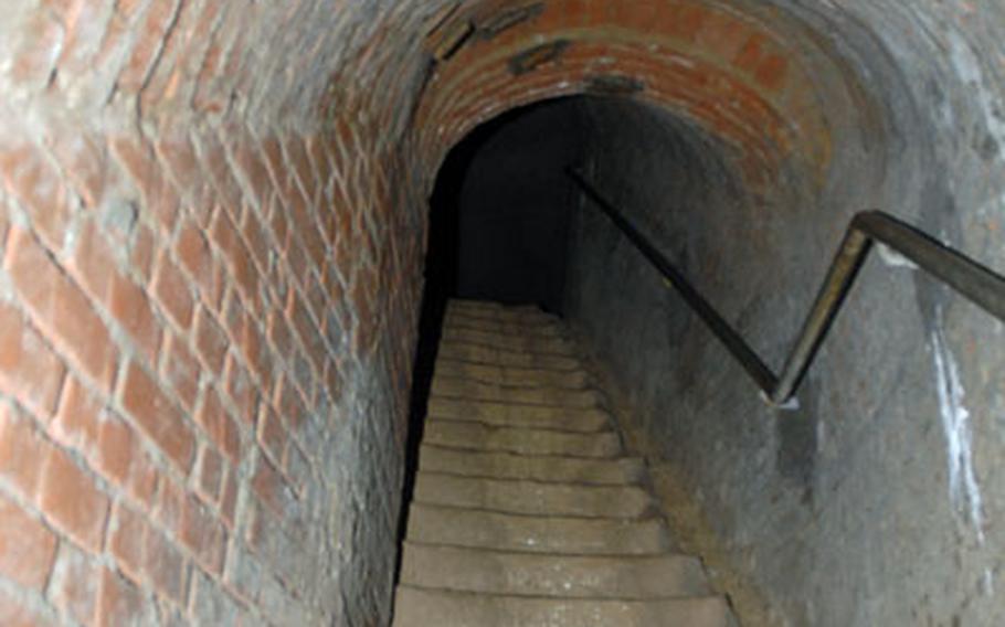 While taking the Tour Under Bamberg, you&#39;ll go down these stairs all the way to river level. Built out of brick instead of the usual sandstone, the entrance into the tunnels was made during World War II for the thousands of workers pulling 24-hour shifts underground.