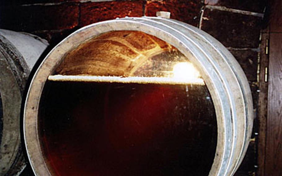 A cut-away of a barrel of vin jaune shows the voile, the film of yeast that forms on top of the wine during its complex aging process.