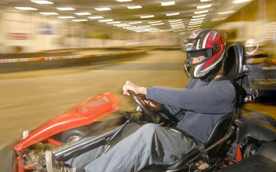 After a short wait, Wesley Hrushka gets his chance to speed of in a cart at Go! Indoor Kart, Erfenbach’s indoor go-cart track. After purchasing a helmet liner, riders are given a full face helmet as protection in the case of a crash.