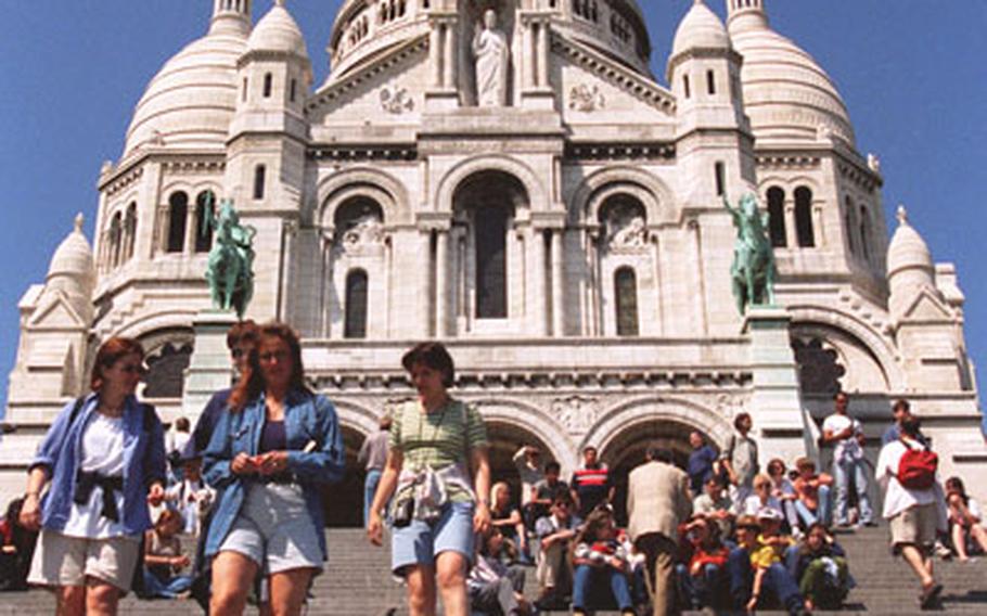 The Sarce Cour basilica in Paris. There is a great view over the city from the stairs leading up to the basilica.