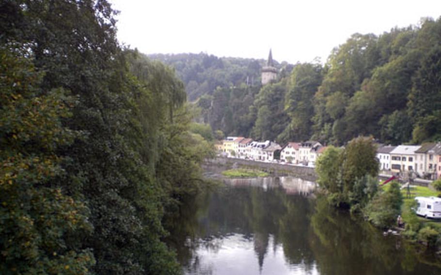 The River Our runs through the town of Vianden, which is crowned by its castle sitting on a rocky bluff.