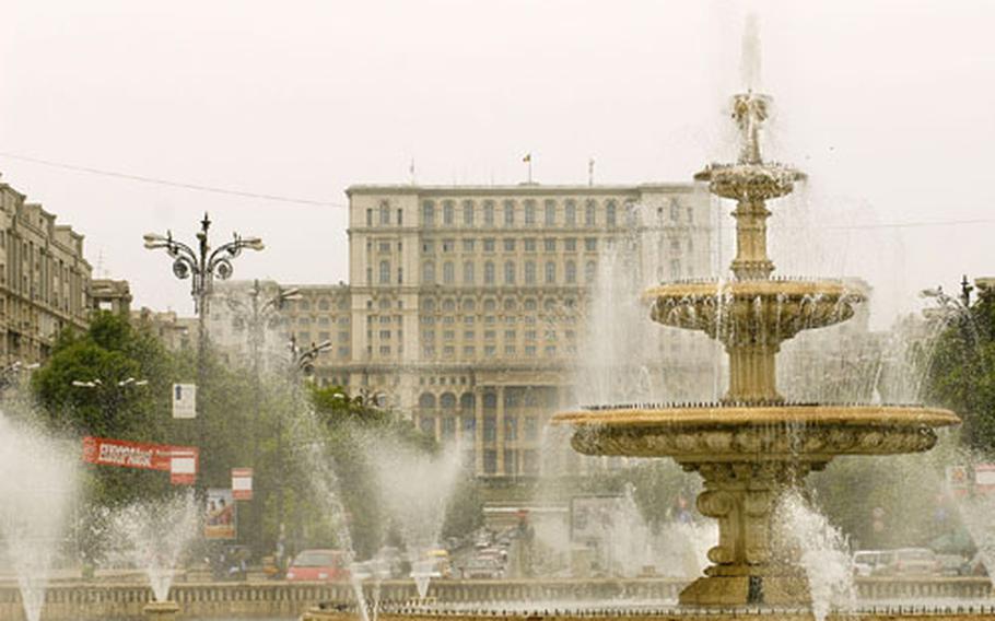 Behind streams of water on the fountain-laced Boulevard Unirii -- designed to mirror Paris’ famed Champs-Élysées but constructed exactly 1 meter wider -- sits the Romanian parliament, the worlds second biggest office building in terms of area.