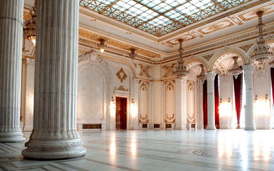 One of many elegant ballrooms in the Parliament building shows the money and care spent on the building that Communist ruler Nicolae Ceausescu considered a monument to himself. All the materials used in the ornate facility are from within Romania.