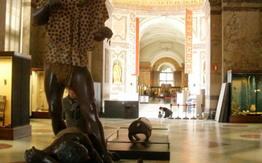 The entrance hall and the first exhibits in the Royal Museum for Central Africa show off the building&#39;s architecture. The museum was originally built to entice European businessmen to invest in the Belgian project in the Congo.
