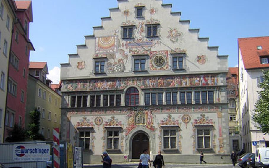 The old town hall is one of the first buildings visible after leaving Lindau&#39;s promenade and heading into the old town. This is the back of the building decorated with painted scenes from the Bible and local history.