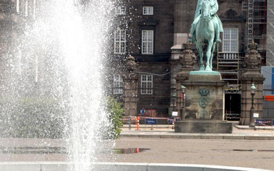 The main courtyard in the Slotsholmen, with Christiansborg Palace in the background.