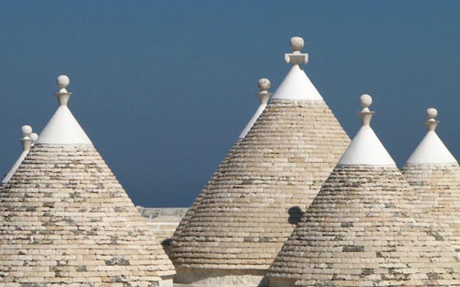 Agriturismos offer a chance to stay in traditional buildings like Trulli country house, one of the whitewashed stucco buildings known for their peculiar conical-shaped stone roofs.