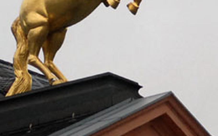 A golden steed tops the Landesmuseum-Mainz. The museum is housed in what formerly were royal stables.