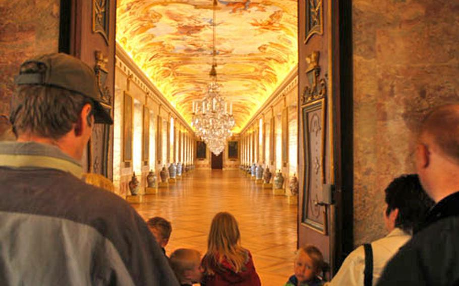 The impressive great hall of Ludwigsburg Palace is detailed with a huge ceiling fresco. The palace is the largest baroque palace in Germany, with 18 main buildings and more than 450 rooms.